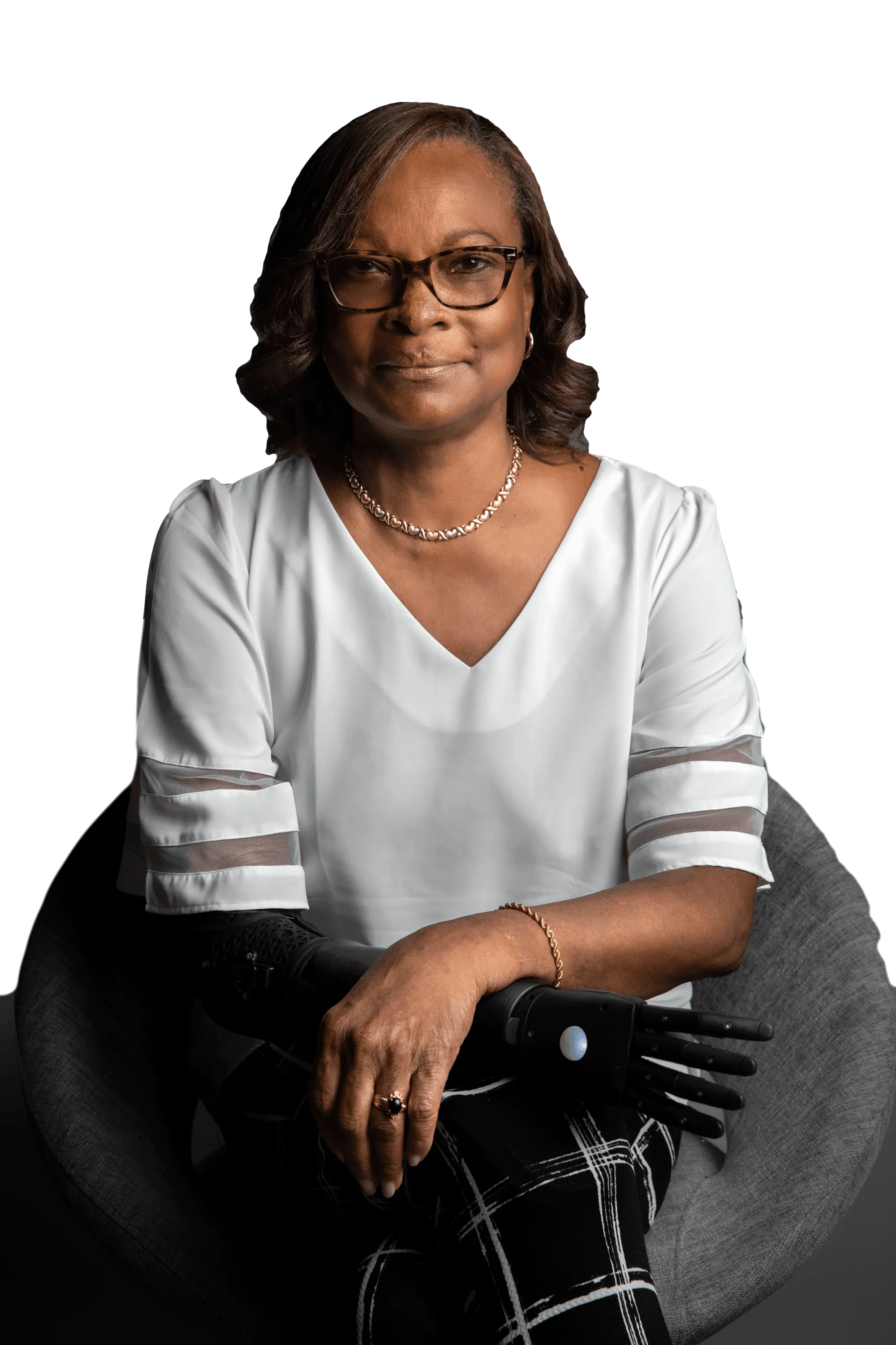 Author Dawn L. Saunders seated, smiling
